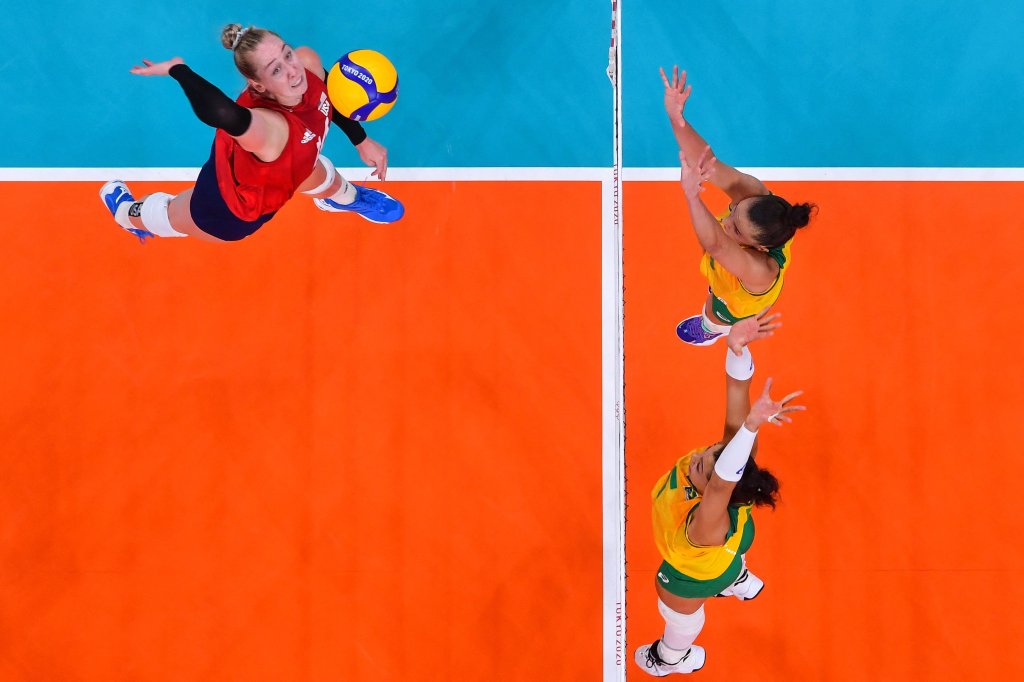 USA's Michelle Bartsch-Hackley (L) spikes the ball in the women's gold medal volleyball match between Brazil and USA during the Tokyo 2020 Olympic Games at Ariake Arena in Tokyo on Aug. 8, 2021.