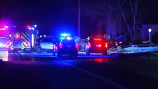 Police investigate the scene of a deadly crash on Sunday, Dec. 8, 2019 in Raynham, Massachusetts.