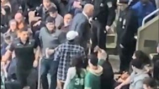 A Celtics fan was arrested on Wednesday, Jan. 8, 2019 after allegedly throwing a beverage at the opposing team's bench when the Celtics faced the Spurs.