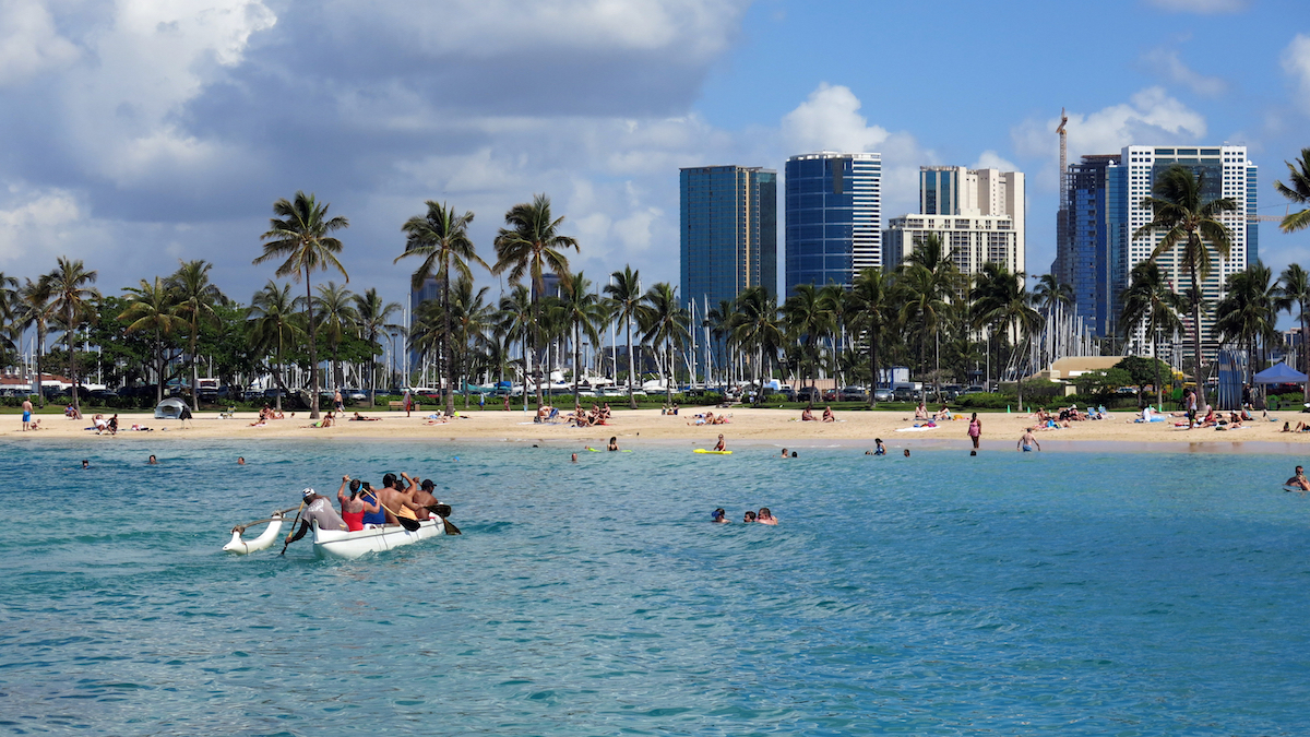 FILE – This May 21, 2014, file photo shows Duke Kahanamoku Beach in the Honolulu tourist neighborhood of Waikiki in Hawaii. Stephen Leatherman, a coastal scientist and professor at Florida International University, has named Duke Kahanamoku Beach the sixth-best in the country.