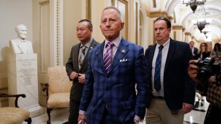 Rep. Jeff Van Drew of New Jersey departs the Capitol after the House of Representatives voted to impeach President Donald Trump on two charges, abuse of power and obstruction of Congress. Van Drew, a Democrat who plans to switch and become a Republican, represents a southern New Jersey district that Trump carried in 2016 and was expected to face a difficult reelection next year.