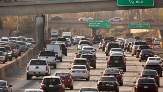 FILE - This Dec. 12, 2018, file photo shows traffic on the Hollywood Freeway in Los Angeles.