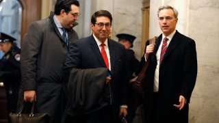 President Donald Trump’s personal attorney Jay Sekulow, center, stands with his son, Jordan Sekulow, left, and White House Counsel Pat Cipollone, while arriving at the Capitol in Washington during the impeachment trial of President Donald Trump on charges of abuse of power and obstruction of Congress, Saturday, Jan. 25, 2020. (AP Photo/Julio Cortez)