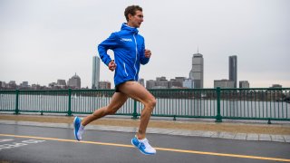 Tyler Andrews runs along the Charles River in Cambridge, Massachusetts, March 29, 2019.