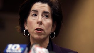 Rhode Island Gov. Gina Raimondo faces reporters during a news conference, March 1, 2020, in Providence, Rhode Island.