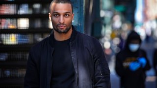 In this March 26, 2020, photo, Rahmell Peeples walks in his neighborhood during an interview in the Brooklyn borough of New York. Peebles, who is skeptical of what he hears from white-run media and government, didn’t see the need for alarm over the new coronavirus. Peebles is one of roughly 40 million black Americans deciding minute by minute whether to put their faith in the government and medicine during the coronavirus pandemic. “I’ve just been conditioned not to trust,” Peebles said.