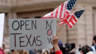 In this April 18, 2020, file photo, protesters speak out against Texas' handling of the COVID-19 outbreak at the Texas State Capitol in Austin, Texas.