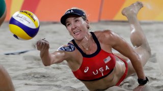 Kerri Walsh Jennings digs for a ball