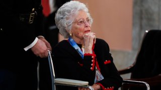 In this Dec. 16, 2016 file photo, Annie Glenn arrives to view the casket of her husband famed astronaut John Glenn as he lies in honor, in Columbus, Ohio. Glenn, the widow of astronaut and U.S. Sen. John Glenn and a communication disorders advocate, died Tuesday, May 19, 2020, of COVID-19 complications at a nursing home near St. Paul, Minn., at age 100.