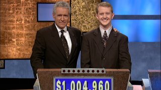 In this July 14, 2004, file photo, "Jeopardy!" host Alex Trebek poses with contestant Ken Jennings after his earnings from his record breaking streak on the gameshow surpassed $1 million in Culver City, California.