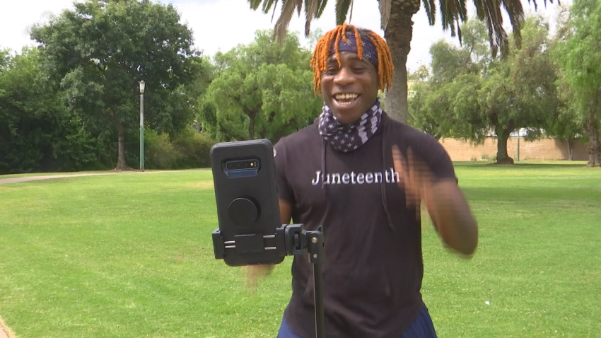 Anthony Merriweather in front of a cell phone camera