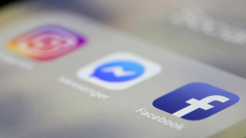 In this March 13, 2019, file photo, Facebook, Messenger and Instagram apps are are displayed on an iPhone in New York.