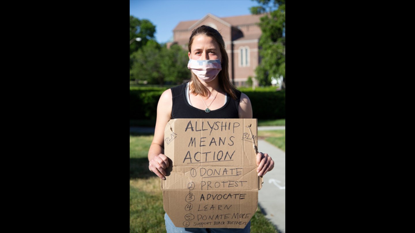 Laura Cowie-Haskell, from Roslindale, at a Black Lives Matter vigil in West Roxbury on Monday, June 8, 2020.