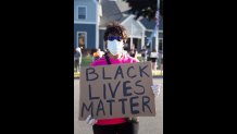 Georgia resident Gail Latimore, who is from Boston, at a Black Lives Matter vigil in West Roxbury on Monday, June 8, 2020.