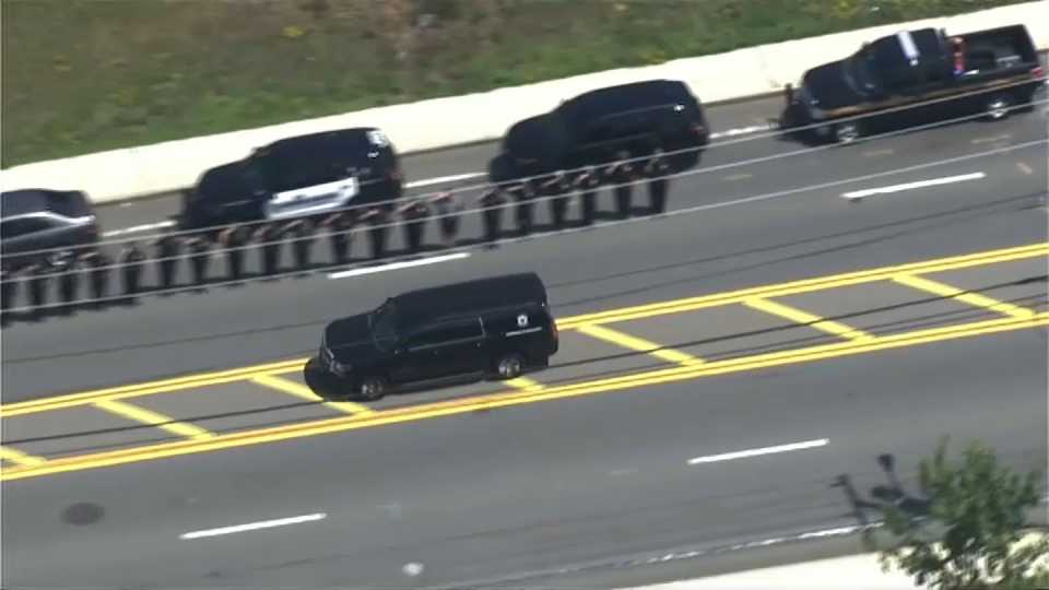 The body of slain Weymouth Police Officer Michael Chesna is transported to the medical examiner.