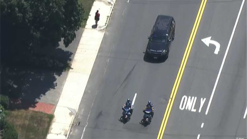 The body of slain Weymouth Police Officer Michael Chesna is transported to the medical examiner.
