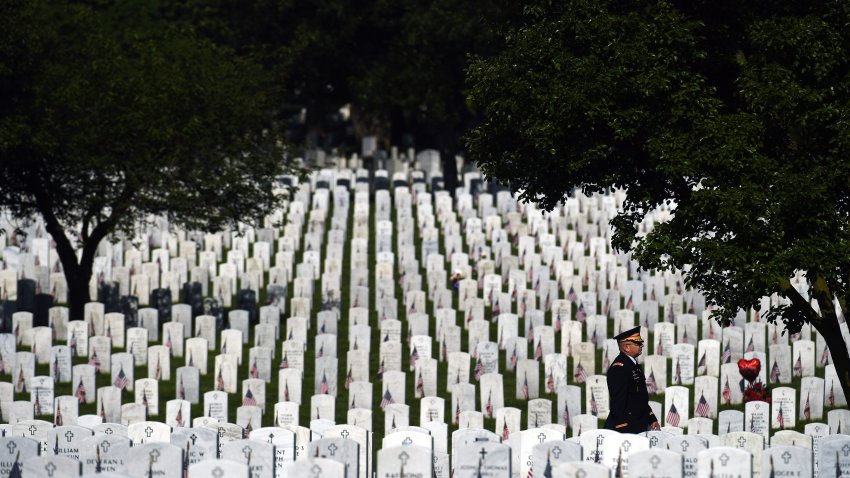 ARLINGTON, VA – MAY 27: A man in uniform walks through Arlington National Cemetery on Monday May 27, 2019 in Washington, DC. Monday was Memorial Day. (Photo by Matt McClain/The Washington Post via Getty Images)