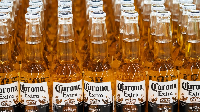 Bottles of Corona beer on a shelf in a store