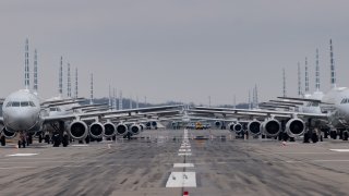 Jets are parked on runway 28 at the Pittsburgh International Airport
