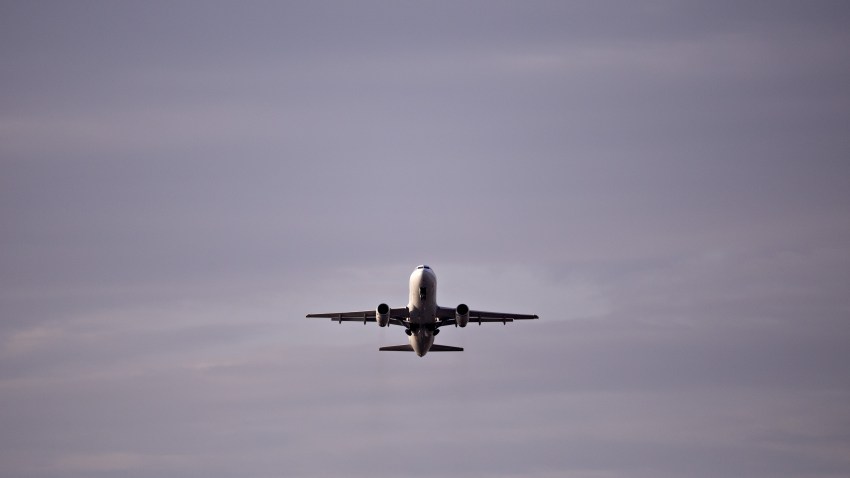 A United Airlines plane departs Reagan National Airport in Arlington, Virginia, U.S., on Monday, April 6, 2020.