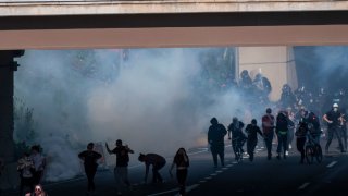 PHILADELPHIA, PA – JUNE 01: Protestors away from tear gas after a march through Center City on June 1, 2020 in Philadelphia, Pennsylvania. Demonstrations have erupted all across the country in response to George Floyd’s death in Minneapolis, Minnesota while in police custody a week ago. (Photo by Mark Makela/Getty Images)