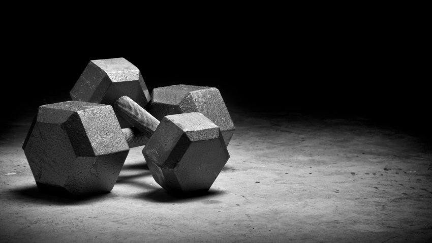 Dumbbells isolated on grungy surface