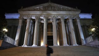 WASHINGTON, DC – OCTOBER 26:  A man walks past the United States National Archives building on October 26, 2017 in Washington, DC. Later today the National Archives will release more than 3,000 classified files on the 1963 assassination of President John F. Kennedy.  (Photo by Mark Wilson/Getty Images)