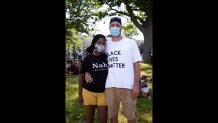 Maureen Azor from Brockton, Mass and Jay Arnold from Westboro, Mass. at a Juneteenth celebration in Ronin Park in Dorchester on June 19, 2020.