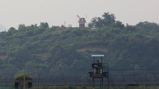Military guard posts of North Korea, rear, and South Korea, foreground, are seen in Paju, at the border with North Korea, South Korea, Tuesday, June 16, 2020.