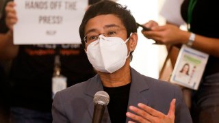 Rappler CEO and Executive Editor Maria Ressa gestures during a press conference near the Manila Regional Trial Court in Manila, Philippines on Monday June 15, 2020. Ressa, an award-winning journalist critical of the Philippine president, was convicted of libel and sentenced to jail Monday in a major blow to press freedom in an Asian bastion of democracy.