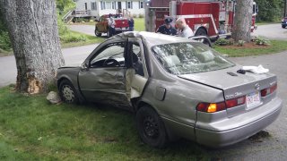 Scene photo from a deadly one-car crash in Norton, Massachusetts.