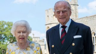 Britain's Queen Elizabeth II and Prince Philip the Duke of Edinburgh pose for a photo June 1, 2020, in the quadrangle of Windsor Castle, in Windsor, England, ahead of his 99th birthday on Wednesday, June 10.