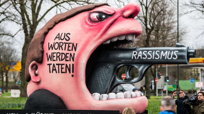 A float with an effigy depicting the current racist situation in Germany is seen ahead of the Rose Monday carnival parade on February 24, 2020 in Dusseldorf, Germany.