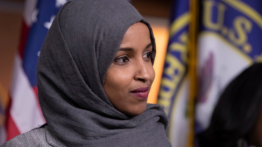 In this Nov. 30, 2018, file photo, Rep.-elect Ilhan Omar, D-Minn., joins House Democratic Leader Nancy Pelosi of California and newly-elected members at a news conference to discuss their priorities when they assume the majority in the 116th Congress in January at the Capitol in Washington.