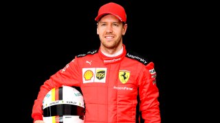 In this March 12, 2020, file photo, Ferrari's German driver Sebastian Vettel poses for a photo at the Albert Park circuit ahead of the Formula One Australian Grand Prix in Melbourne.
