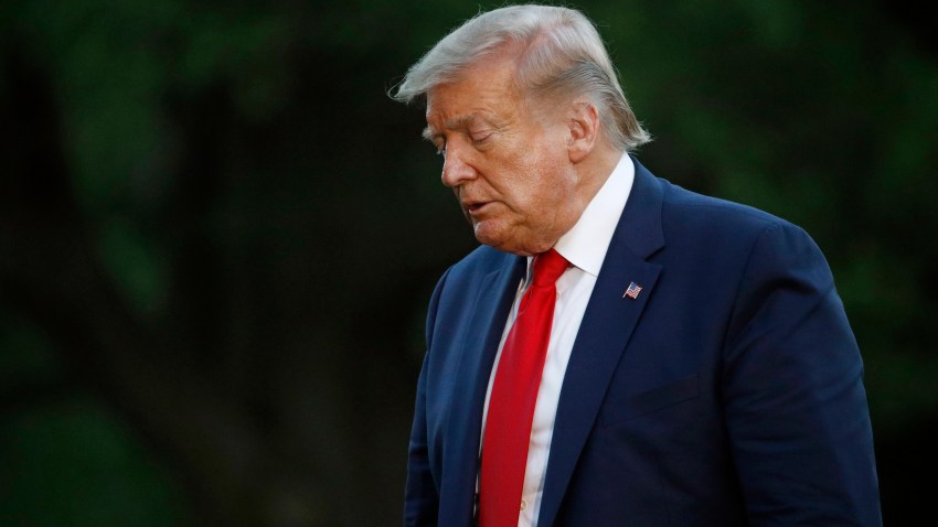 In this May 30, 2020, file photo, President Donald Trump walks across the South Lawn of the White House in Washington after stepping off Marine One as he returns from Kennedy Space Center for the SpaceX Falcon 9 launch.