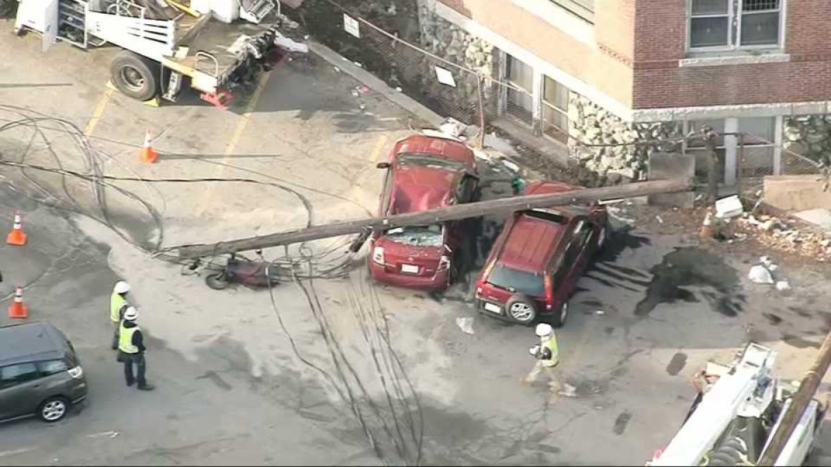 Utility Pole Falls Onto 2 Parked Vehicles in Waltham – NBC Boston