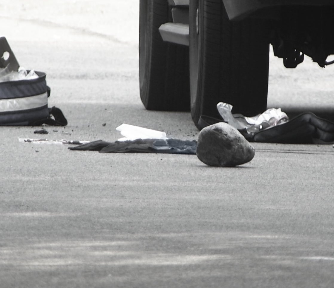 The suspect, Emanuel Lopes, allegedly used this rock to attack Officer Chesna.