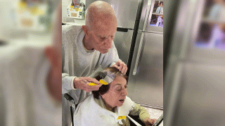 Yael Shapira Avraham shared this photo of her grandfather coloring her grandmother's hair on Facebook.