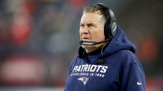 Jan 4, 2020; Foxborough, Massachusetts, USA; New England Patriots head coach Bill Belichick watches the game against the Tennessee Titans during the second quarter at Gillette Stadium. Mandatory Credit: Greg M. Cooper-USA TODAY Sports