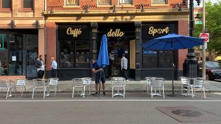 Outdoor dining is set up outside Caffe Dello Sporto in Boston's North End