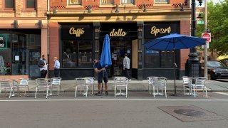 Outdoor dining is set up outside Caffe Dello Sporto in Boston's North End