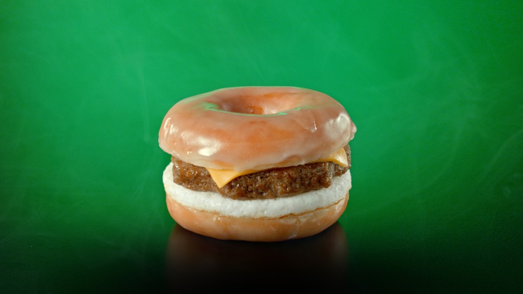 The "Beyond D-O-Double G Sandwich," boasting a plant-based sausage patty with egg and cheese between a sliced glazed donut, is available between January 13 to January 19.