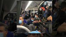 A crowded MBTA bus amid the coronavirus pandemic