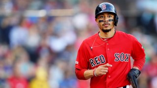 BOSTON, MASSACHUSETTS – SEPTEMBER 29: Mookie Betts #50 of the Boston Red Sox looks on during the third inning against the Baltimore Orioles at Fenway Park on September 29, 2019 in Boston, Massachusetts. (Photo by Maddie Meyer/Getty Images)