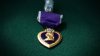 Mass. teacher lied about Purple Heart, degrees, prosecutors say