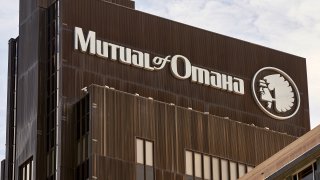 The Mutual of Omaha logo is seen at the company's corporate headquarters in Omaha, Neb., Friday, July 17, 2020. Insurance company Mutual of Omaha has announced it will replace its longtime corporate logo, which features a depiction of a Native American chief.