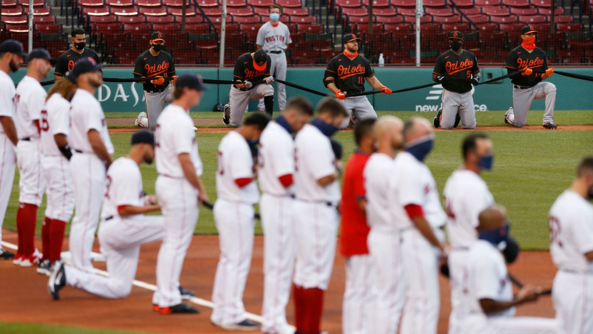 Members of the Boston Red Sox celebrate after the final out of