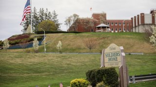 HOLYOKE, MA – APRIL 29: An American flag flies at half-mast outside the Holyoke Soldiers’ Home on April 29, 2020 in Holyoke, Massachusetts. In one of the deadliest known COVID-19 outbreaks at a long-term care center in the U.S., more than 70 residents have reportedly died at the veteran living facility as dozens more residents and employees have tested positive for the virus. (Photo by Matthew Cavanaugh/Getty Images)