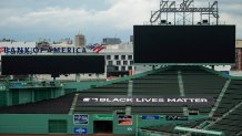 BOSTON, MA - JULY 23: A Black Lives Matter tarp is displayed in the outfield bleacher seats before the start of the 2020 Major League Baseball season on July 23, 2020 at Fenway Park in Boston, Massachusetts. The season was delayed due to the coronavirus pandemic. (Photo by Billie Weiss/Boston Red Sox/Getty Images)